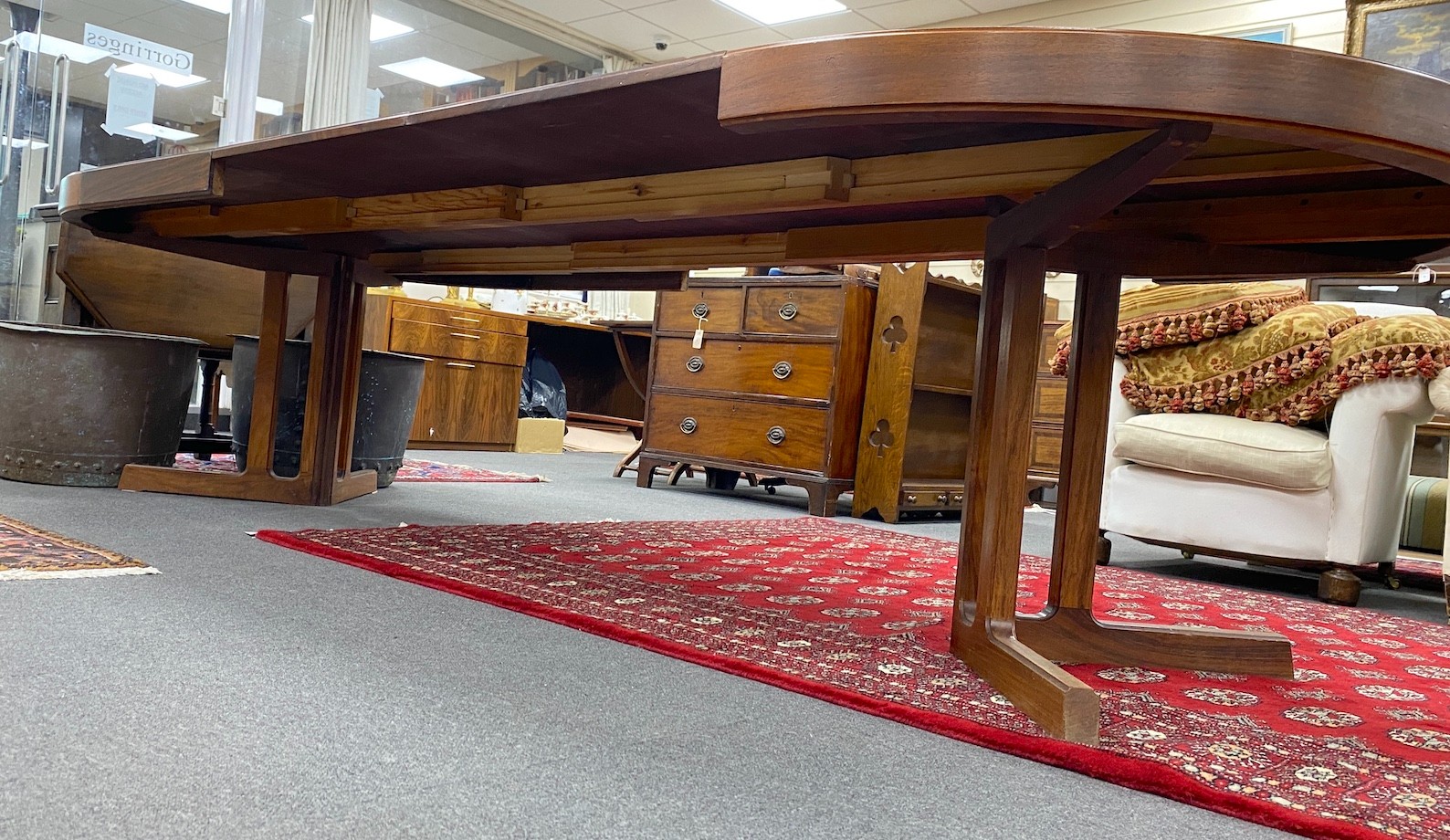 A mid century Danish design Indian rosewood extending dining table, 308cm extended, three spare leaves, width 129cm, height 72cm